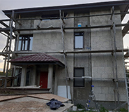 Облицовка двухэтажного дома из пеноблоков