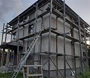 Облицовка двухэтажного дома из пеноблоков