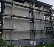 Облицовка двухэтажного дома из пеноблоков